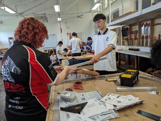 Students participating in robotics activities